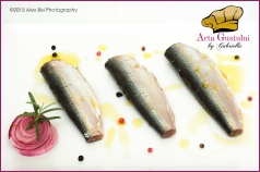 Sardine marinate cu suc de portocale,lamaie si otet de visine